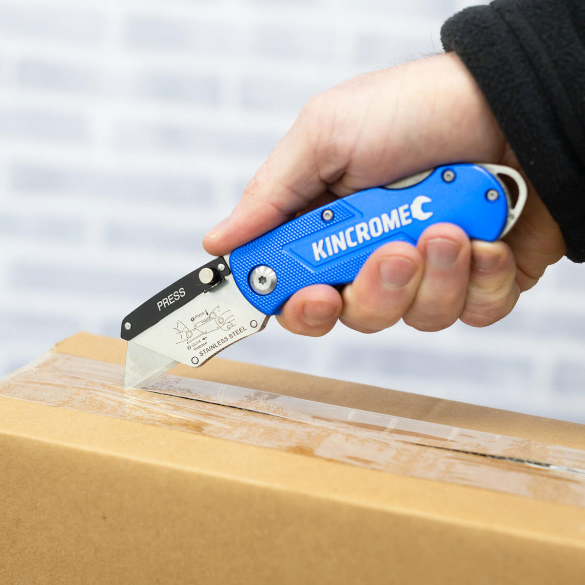 Kincrome Folding Utility Knife Quick Release in  use